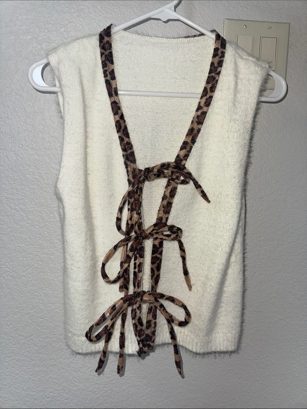 Cozy Ivory Knit Vest with Leopard Tie-Front Detail